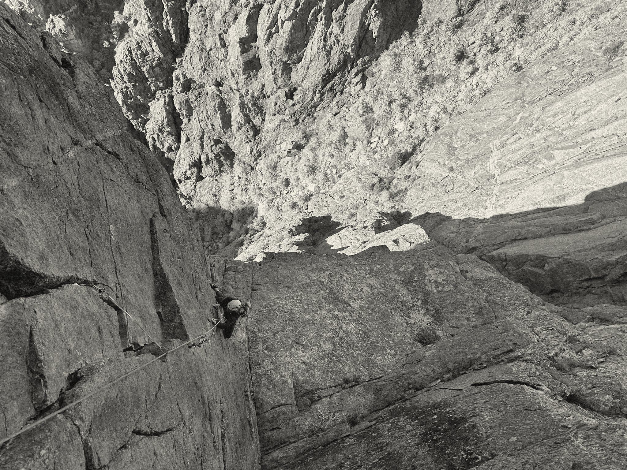 Isaac Rubey, SendSage's founder, climbing a crack